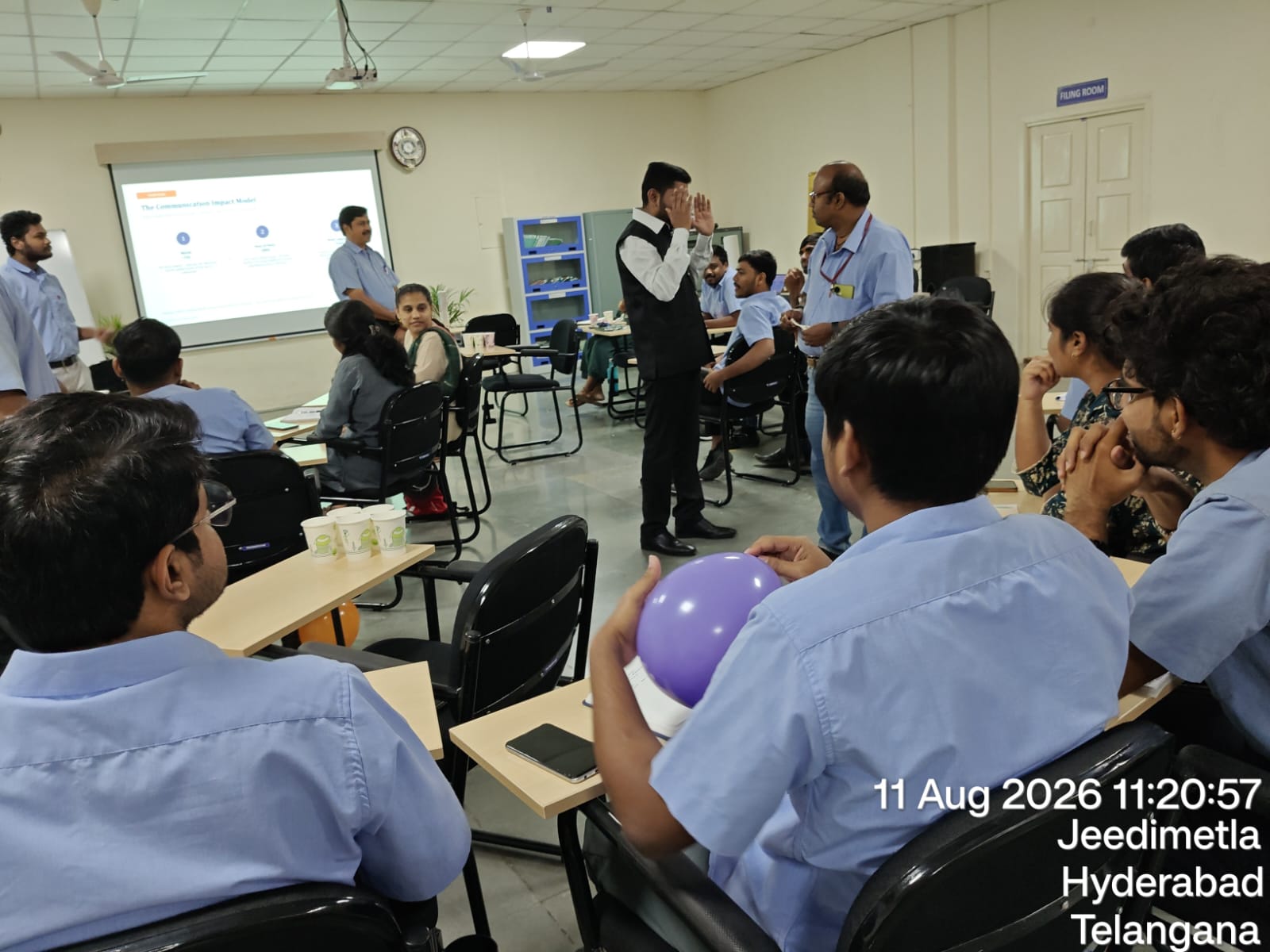 Participants engaging in an active icebreaker round to break communication barriers