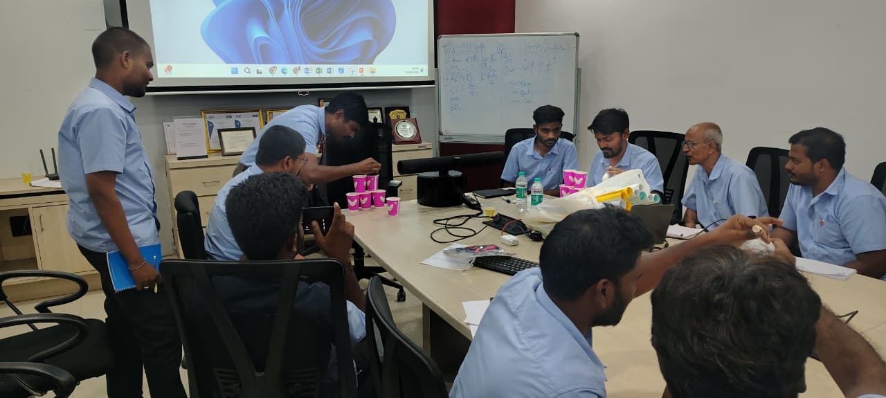Thermo Cables management team analyzing workplace communication frameworks